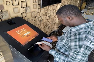 A bitcoin user checks the receipts after buying bitcoins with naira on Bitcoin Teller Machine in Lagos, Nigeria September 1, 2020. Picture taken September 1, 2020. REUTERS/Seun Sanni