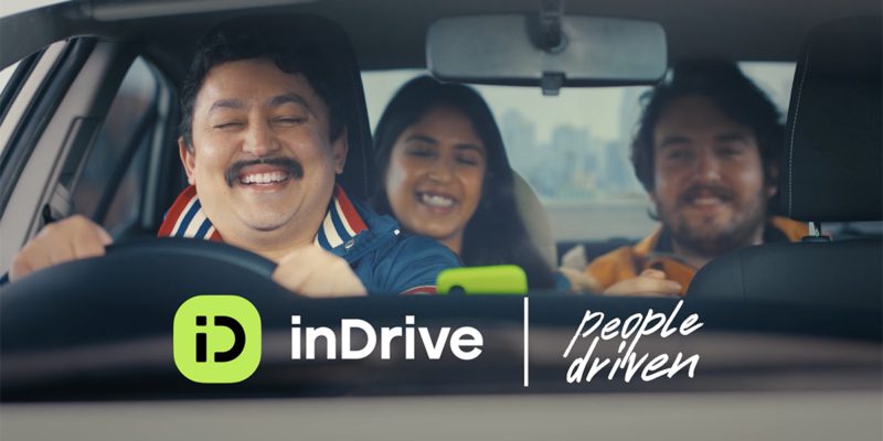 inDriver driver with two passengers
