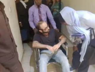 Judge orders arrest of hospital's medical director as Tigran Gambaryan appears in wheelchair